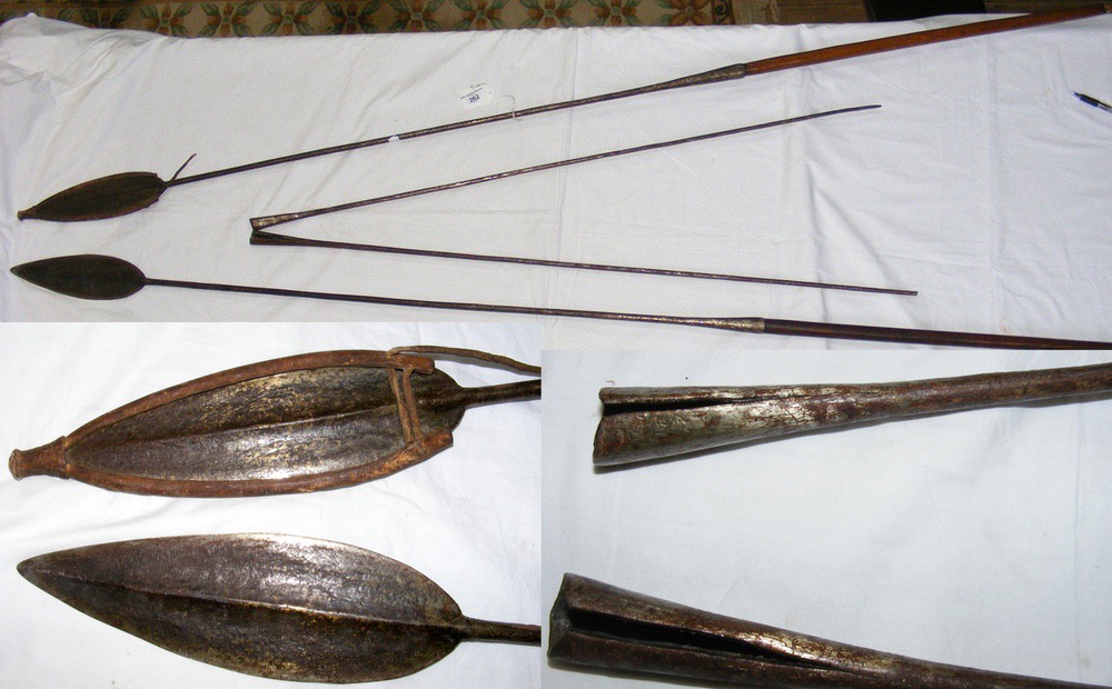 Two old African spears with wooden shafts