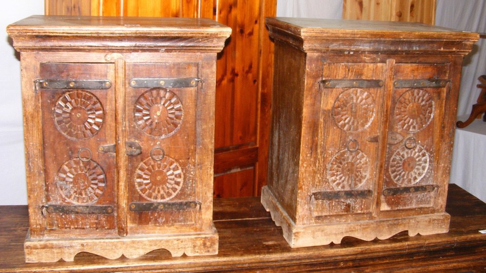 A pair of continental style side cupboards