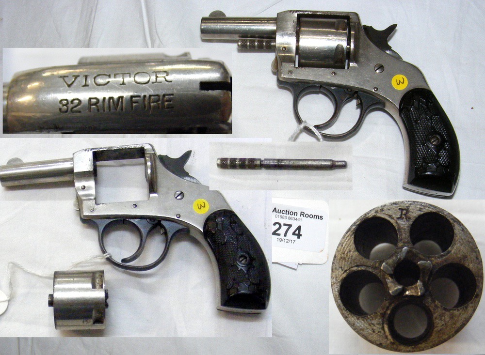 A .32 rim fire "Victor" D/A revolver with decorative grip