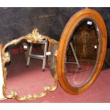 Decorative gilt wall mirror, together with an oval wall mirror