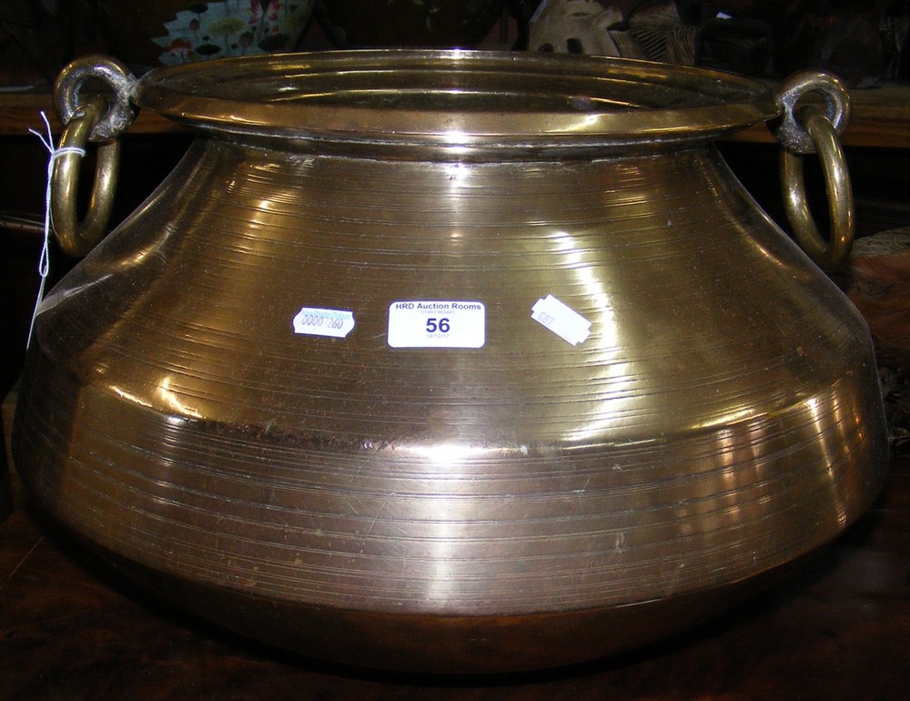 A large brass log bin/planter - 40cm diameter