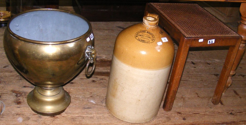 A large stoneware flagon, together with a brass log bin and stool