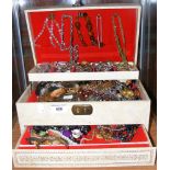 A large selection of costume jewellery - necklaces, brooches, etc.