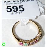 A 9ct gold ring with multi-coloured stones (R.E.G.A.R.D.S)