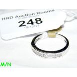 An 18ct white gold Princess cut diamond half hoop eternity ring (approx. 0.42 carat)