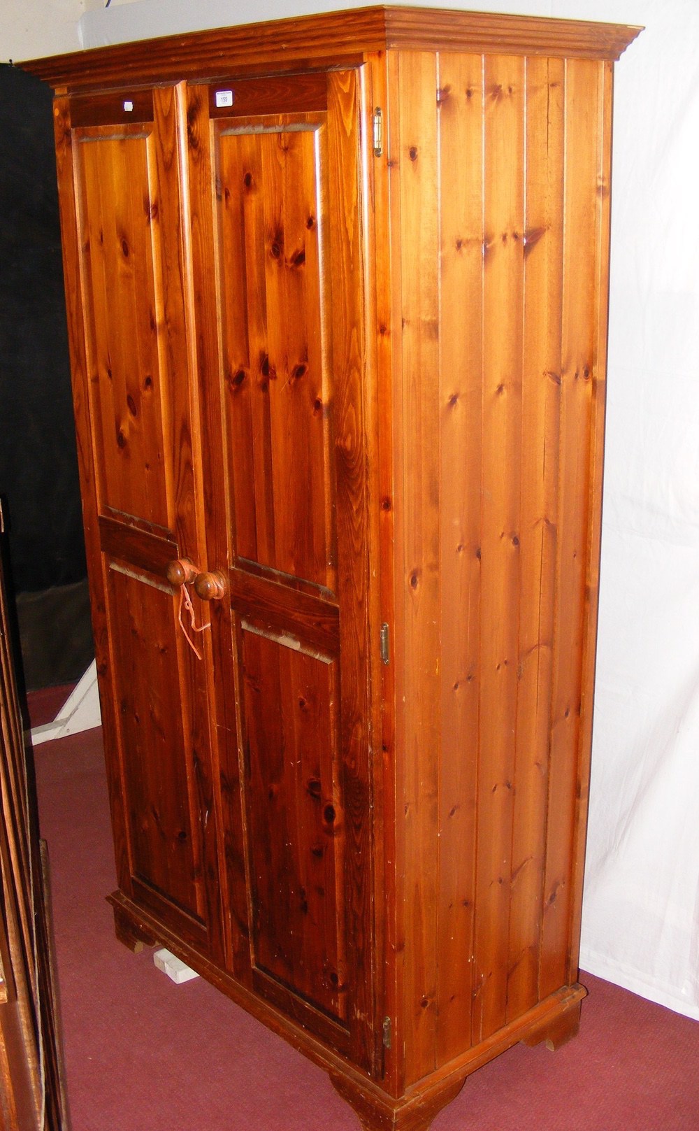 A pine two door wardrobe