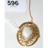 An 18ct gold mounted oval agate set Cameo brooch with wirework surround