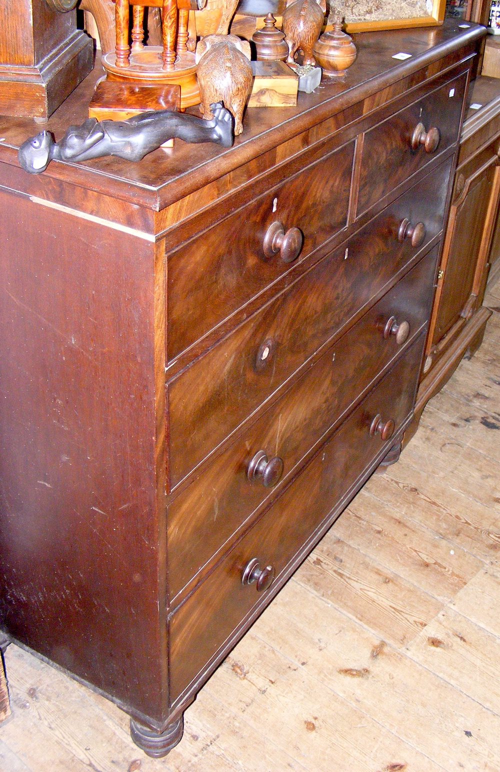 A Victorian mahogany chest of two short and three long drawers