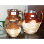 Three Doulton stoneware jugs with silver rims