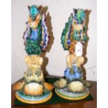 Pair of 30cm high stylized faience ware candlesticks