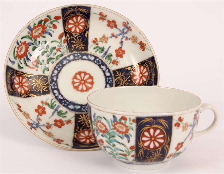 A First Period Worcester Polychrome TEA CUP and SAUCER with colourful flower spray decoration in the