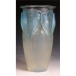 R. LALIQUE, FRANCE An opaque and relief moulded VASE highlighted in blue staining "Ceylan" 24cm high