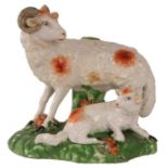 An early 19th Century Staffordshire Bocage FIGURE of a Ewe and Lamb on floral encrusted grassy