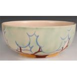 A Clarice Cliff Bizarre FRUIT BOWL decorated in a tree lined landscape setting on a fawn ground 21cm