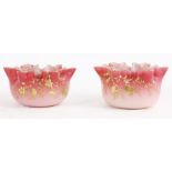 A PAIR OF 19TH CENTURY DEEP SHADED PINK OPAQUE GLASS HANDKERCHIEF BOWLS with gilt edge relief work