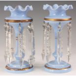 A PAIR OF LATE 19TH CENTURY PALE BLUE OPAQUE GLASS LUSTRES with frilled rims, circular bases and