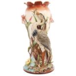 A LARGE 19TH CENTURY MAJOLICA STICK STAND with a heron fishing on a floral ground 56cm high