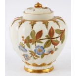 A ROYAL WORCESTER GILT EDGED LOBED IVORY GROUND POTPOURRI JAR AND INNER COVER decorated colourful