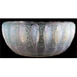 A LALIQUE HEAVY OPALESCENT GLASS ‘PERRUCHES’ BOWL with lightly green stained ground between a