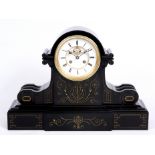 A 19TH CENTURY FRENCH LARGE BLACK SLATE AND GILT FOLIATED MANTEL CLOCK with eared arched top and