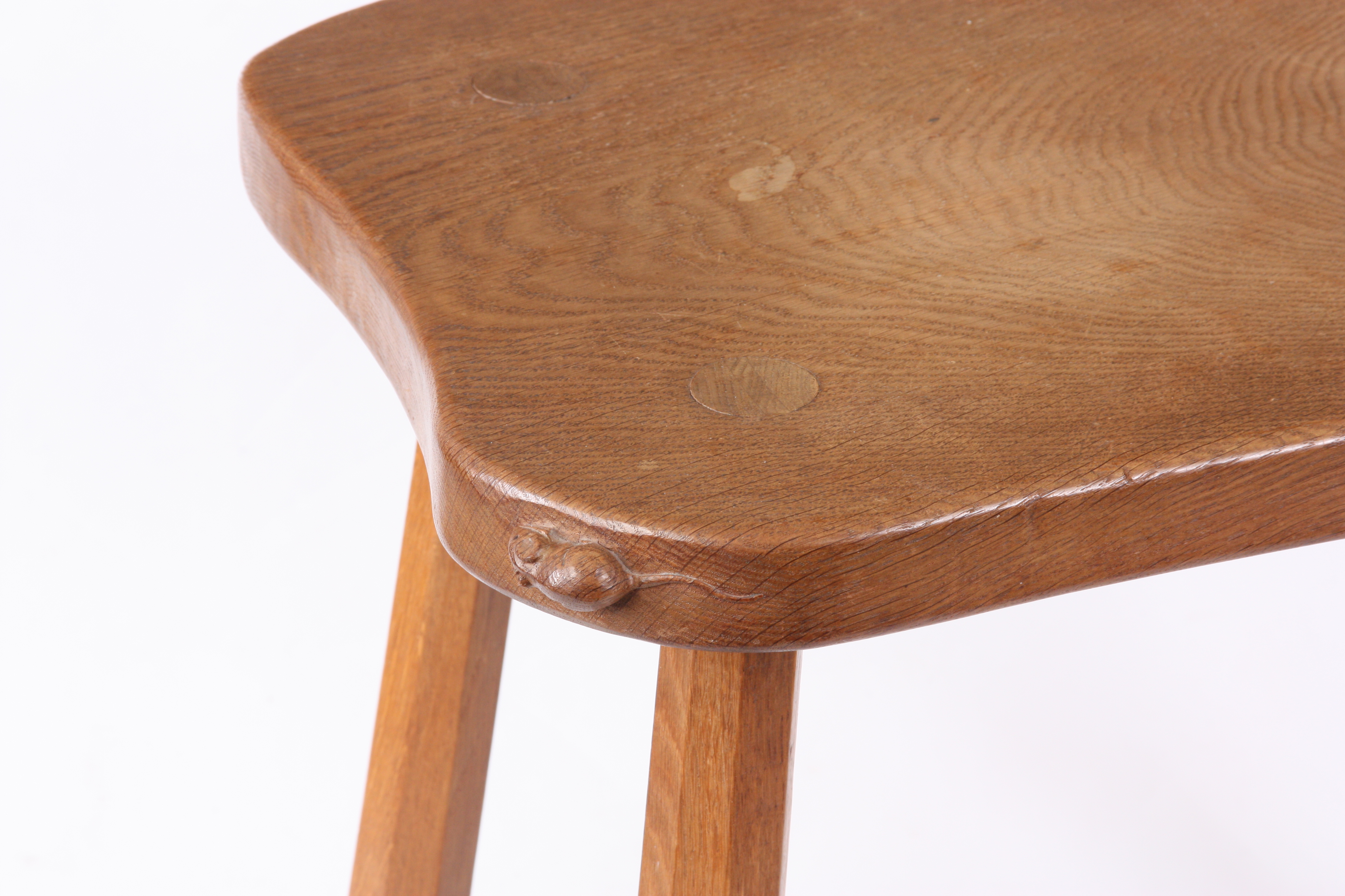 A ROBERT “MOUSEMAN” THOMPSON AZED OAK SIDE TABLE with dished shaped top, standing on hexagonal - Image 2 of 3