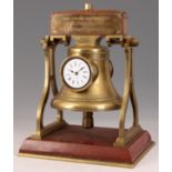 A LATE 19th CENTURY FRENCH INDUSTRIAL MANTEL CLOCK in the form of a ships bell on red marble base,