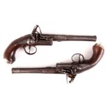 J JOHNSON, WIGAN A PAIR OF QUEEN ANNE SILVER MOUNTED WALNUT FLINTLOCK PISTOLS the breach with