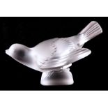 A LALIQUE FROSTED GLASS MODEL OF A SPARROW, signed Lalique (R) France 13.5cm wide 8.5cm high.