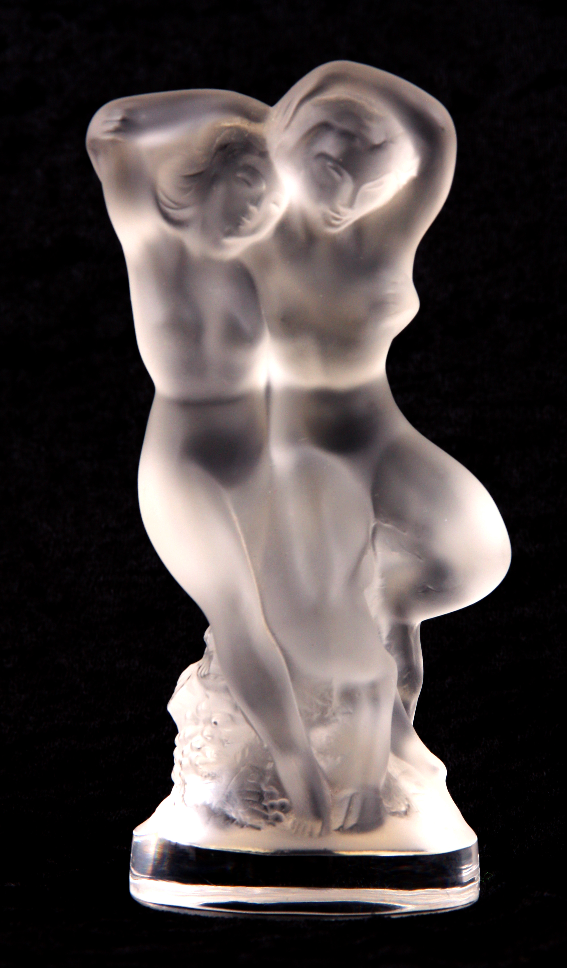 A LALIQUE FROSTED GLASS MODEL OF PAN AND DIANA, signed Lalique (R) France 14cm high.