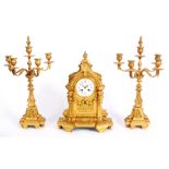 RAINGO-FRERES, PARIS A MID 19TH CENTURY FRENCH GILT ORMOLU THREE PIECE CLOCK GARNITURE the ornate