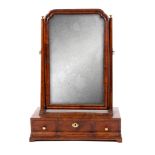 A GEORGE I WALNUT DRESSING TABLE MIRROR with adjustable cross grained moulded looking glass above