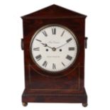 PETER CANOVA HALESWORTH A LATE REGENCY FIGURED MAHOGANY BRACKET CLOCK with 8” painted convex Roman