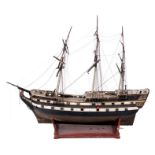 AN 18TH/19TH CENTURY LARGE PAINTED WOOD MODEL OF A THREE MASTED GALLEON 177cm overall.