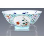 A CHINESE DAOGUANG PERIOD MEDALLION BOWL with turquoise coloured ground and fine scroll work and