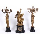 AN IMPRESSIVE 19TH CENTURY FRENCH BRONZE AND GILT METAL THREE PIECE CLCOK GARNITURE WITH BLACK