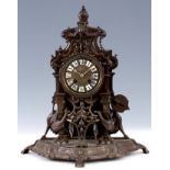 A FRENCH LATE 19TH CENTURY BRONZE MANTEL CLOCK a case with pierced leaf and scroll work decoration