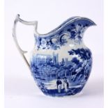 AN EARLY 19TH CENTURY BLUE AND WHITE WATER JUG transfer printed all round with views of Eton college