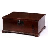 AN 18TH CENTURY OAK DESK BOX with iron lock plate and fastener; on a cut out shallow plinth base
