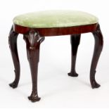 A GEORGE I MAHOGANY OVAL DRESSING STOOL with pale green velvet upholstered seat above a cross banded