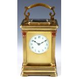 A LARGE LATE 19th CENTURY FRENCH GRAND SONNERIE REPEATING CARRIAGE CLOCK the brass case having