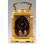 A FINE LATE 19TH CENTURY FRENCH GILT BRASS REPEATING CARRIAGE CLOCK WITH LIMOGES ENAMELLED DIAL