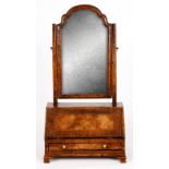 A QUEEN ANNE STYLE HERRINGBAND STRUNG AND CROSS BANDED WALNUT DRESSING TABLE MIRROR with cross grain