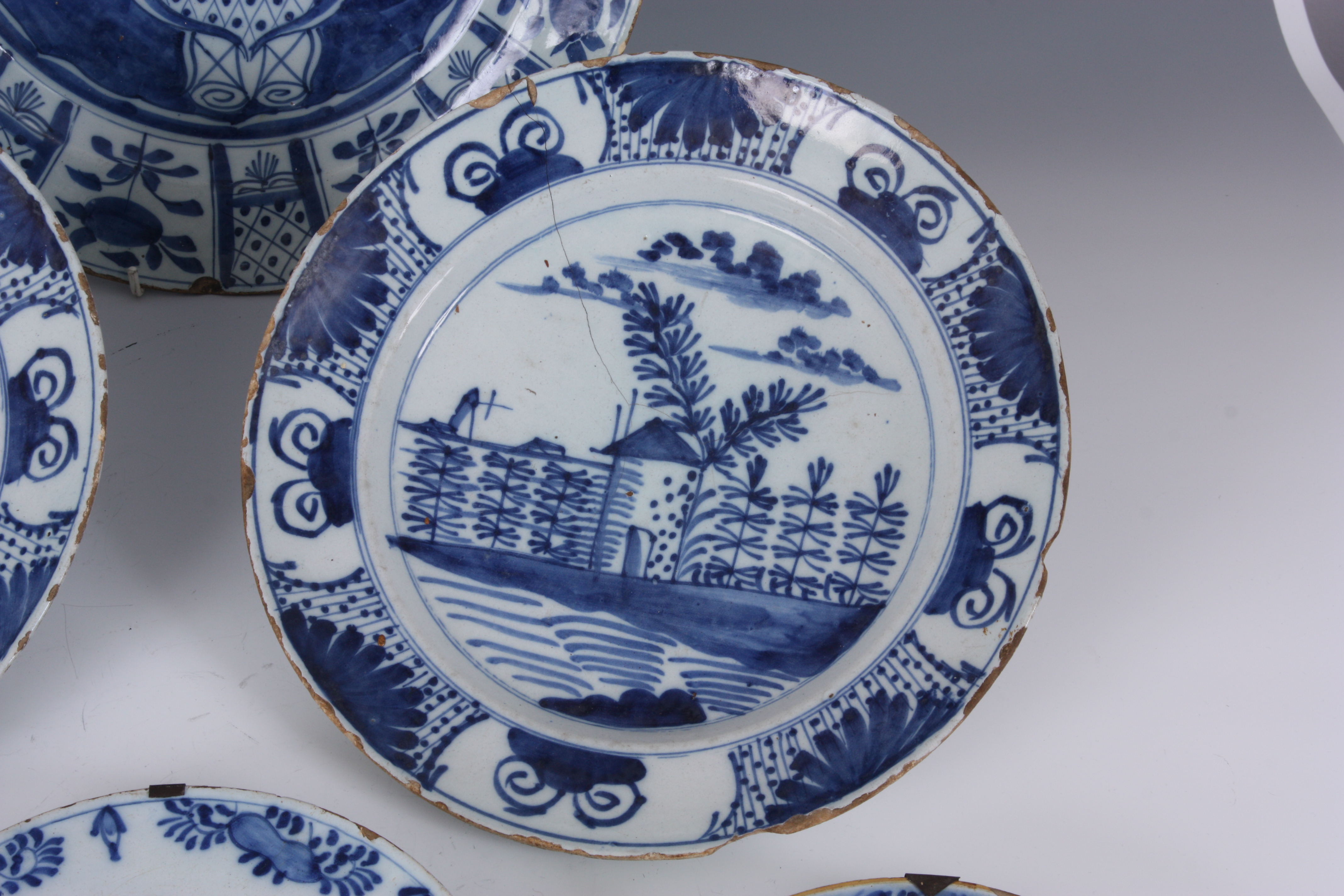 A COLLECTION OF 18TH CENTURY BLUE AND WHITE DUTCH DELFTWARE comprising a large shallow dish with - Image 10 of 14