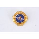 A LATE 19TH CENTURY YELLOW GOLD AND BLUE ENAMEL MICRO MOSAIC CIRCULAR BROCH with finely crafted
