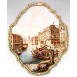 A LATE 19TH CENTURY SHAPED CONTINENTAL PORCELAIN PLAQUE depicting a Venetian scene of gondolas on