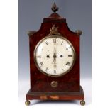 A LATE REGENCY MAHOGANY BRACKET CLOCK the 7" painted convex dial with Roman numerals fronting an