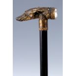 A FINE MID 19TH CENTURY BRONZE ORMOLU DOG’S HEAD WALKING STICK realistically modelled as a greyhound