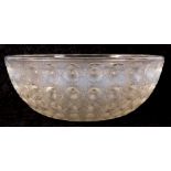 A LALIQUE OPALESCENT GLASS ’NEMOURS’ BOWL externally decorated with radiating graduating flowers
