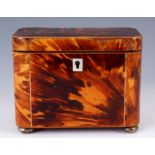 A 19TH CENTURY BONE STRUNG SHADED BLONDE TORTOISESHELL RECTANGULAR TEA CADDY with rounded corners