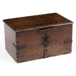 A 17TH CENTURY CONTINENTAL SMALL OAK IRON BOUND STRONG BOX/ COFFER with hinged lid and original